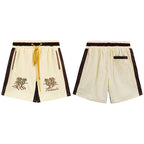 Rhude Cream Embroidered Nylon Shorts