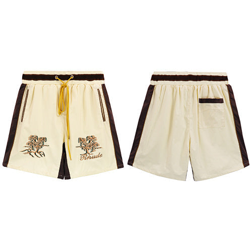 Rhude Cream Embroidered Nylon Shorts Hover Image