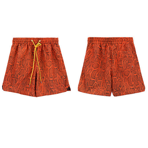 Rhude Orange Snake Print Nylon Shorts Hover Image