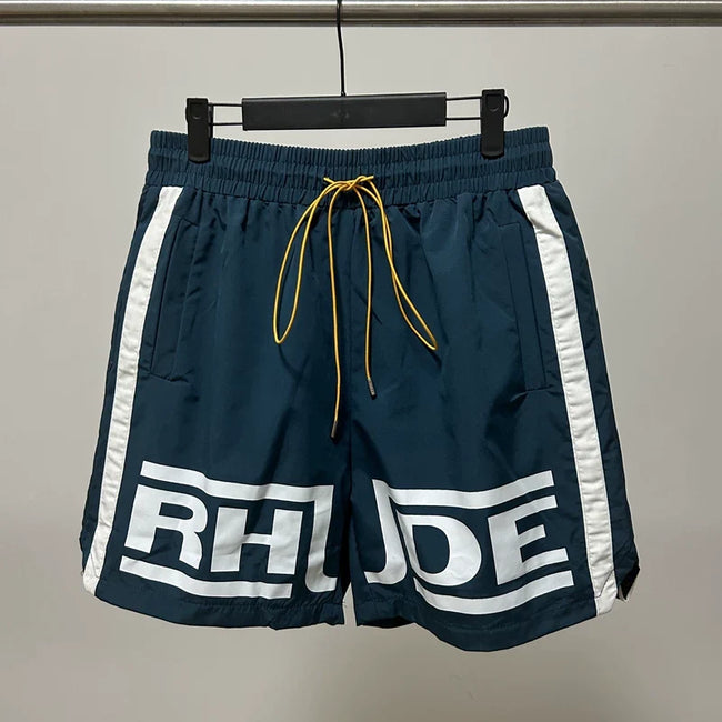 Rhude Side Stripe Big Logo Nylon Shorts Hover Image