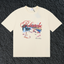Rhude Cannes Tropical Beach Scene Script Cream Oversized T‑Shirt